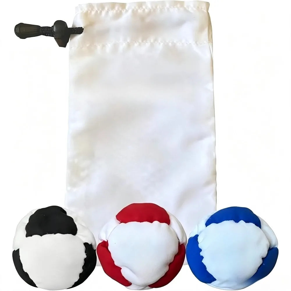 Three white-panel hacky sacks in black, red and blue with a white drawstring pouch
