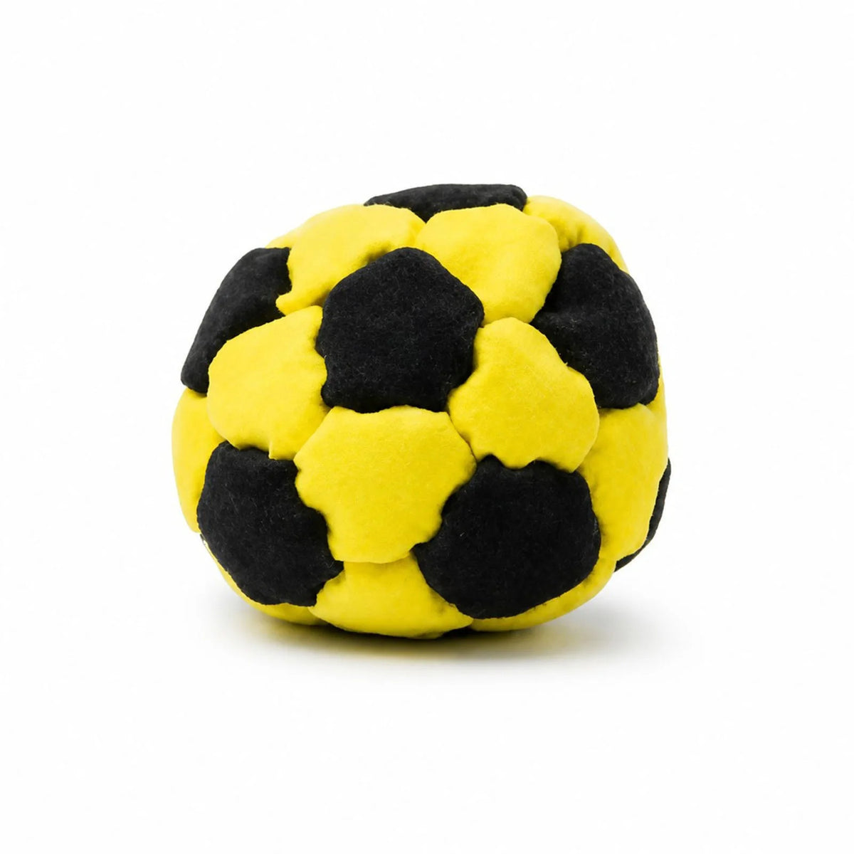 Black and yellow soft soccer footbag on a white background